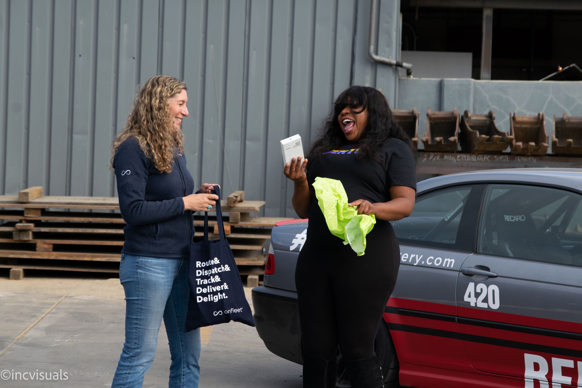 Onfleet team member Liz awards Peaches her new phone!