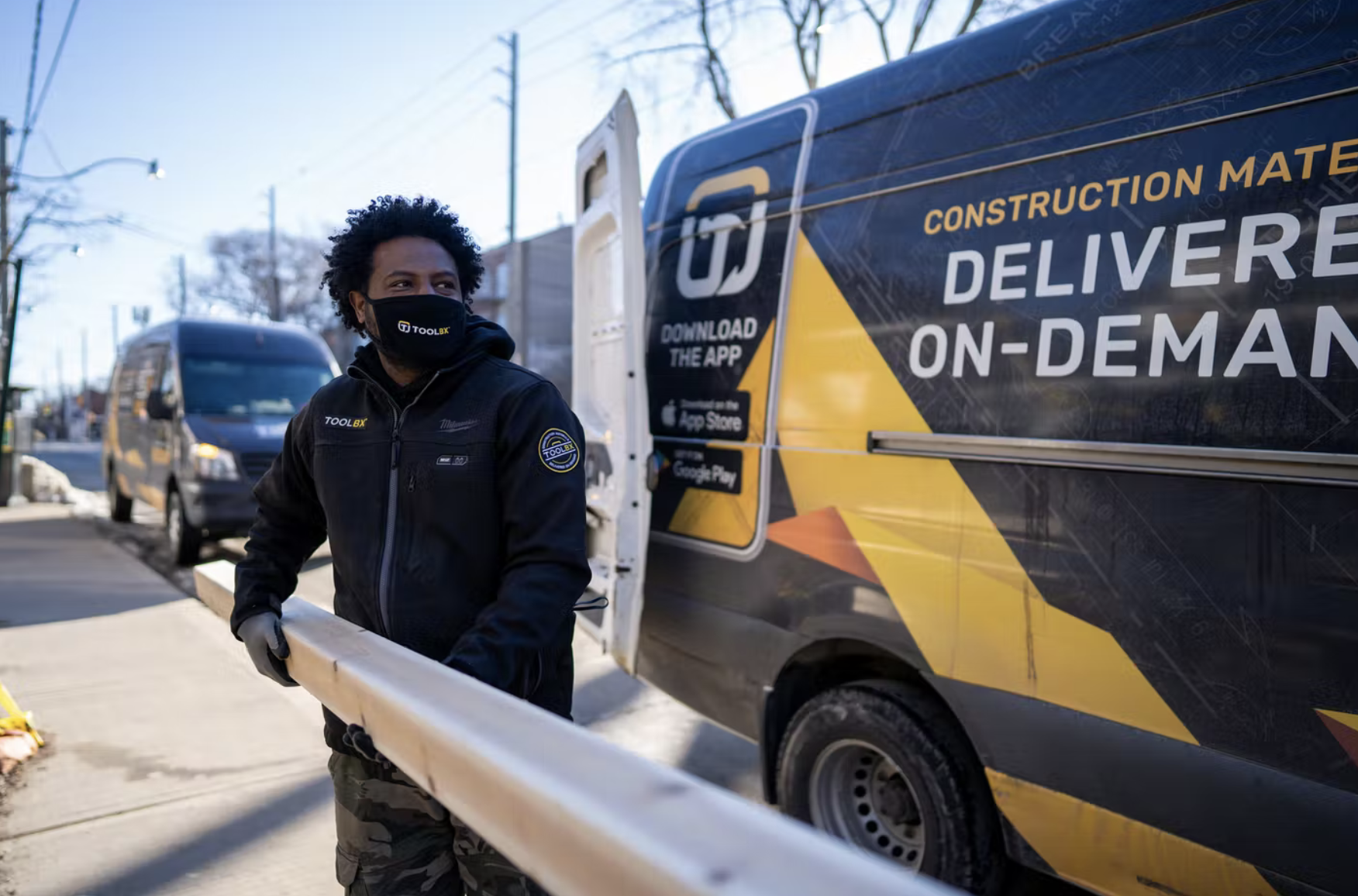 A driver for TOOLBX delivers construction materials.